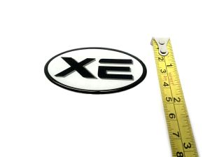 EMBLEMA NISSAN FRONTIER BRA 03-05